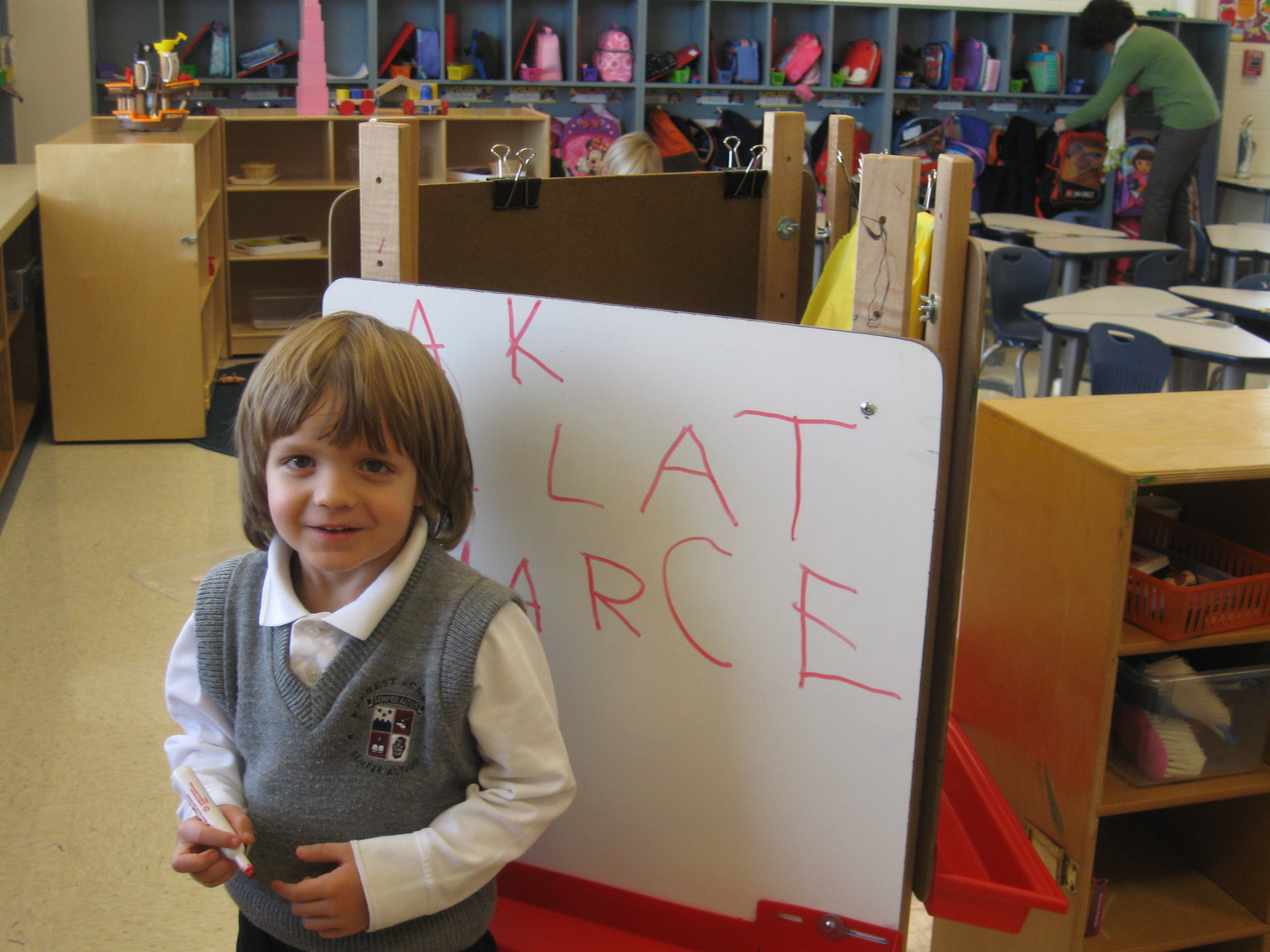 Marcel, son of Rafal & Klaudia Latak, of Burr Ridge, fills his canvas at Everest Academy's full day Prekindergarten program