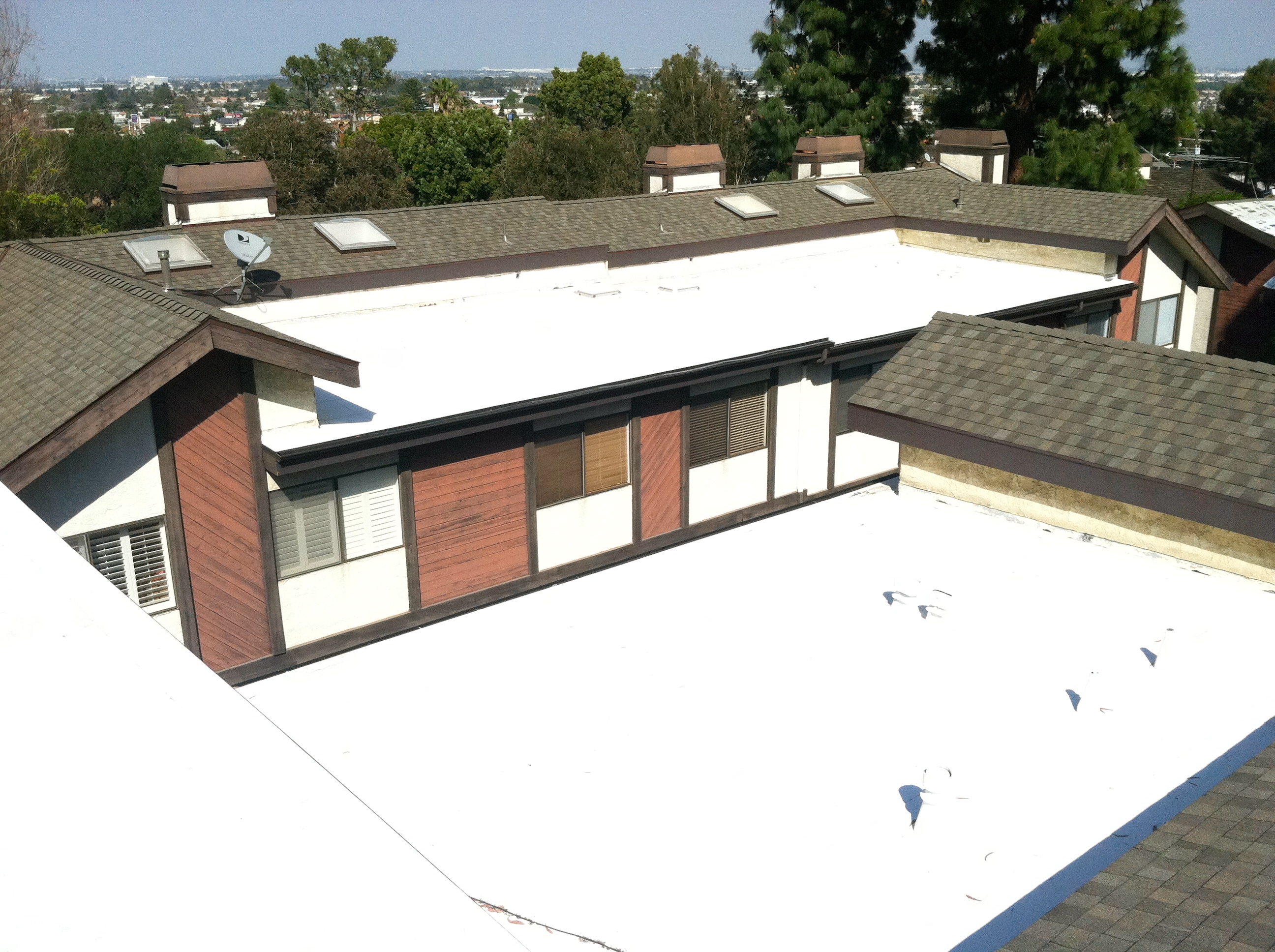 80 Mil IB Roof System installed by Chandler's Roofing along with GAF Timberline shingles on The Pines HOA in Lomita, CA.