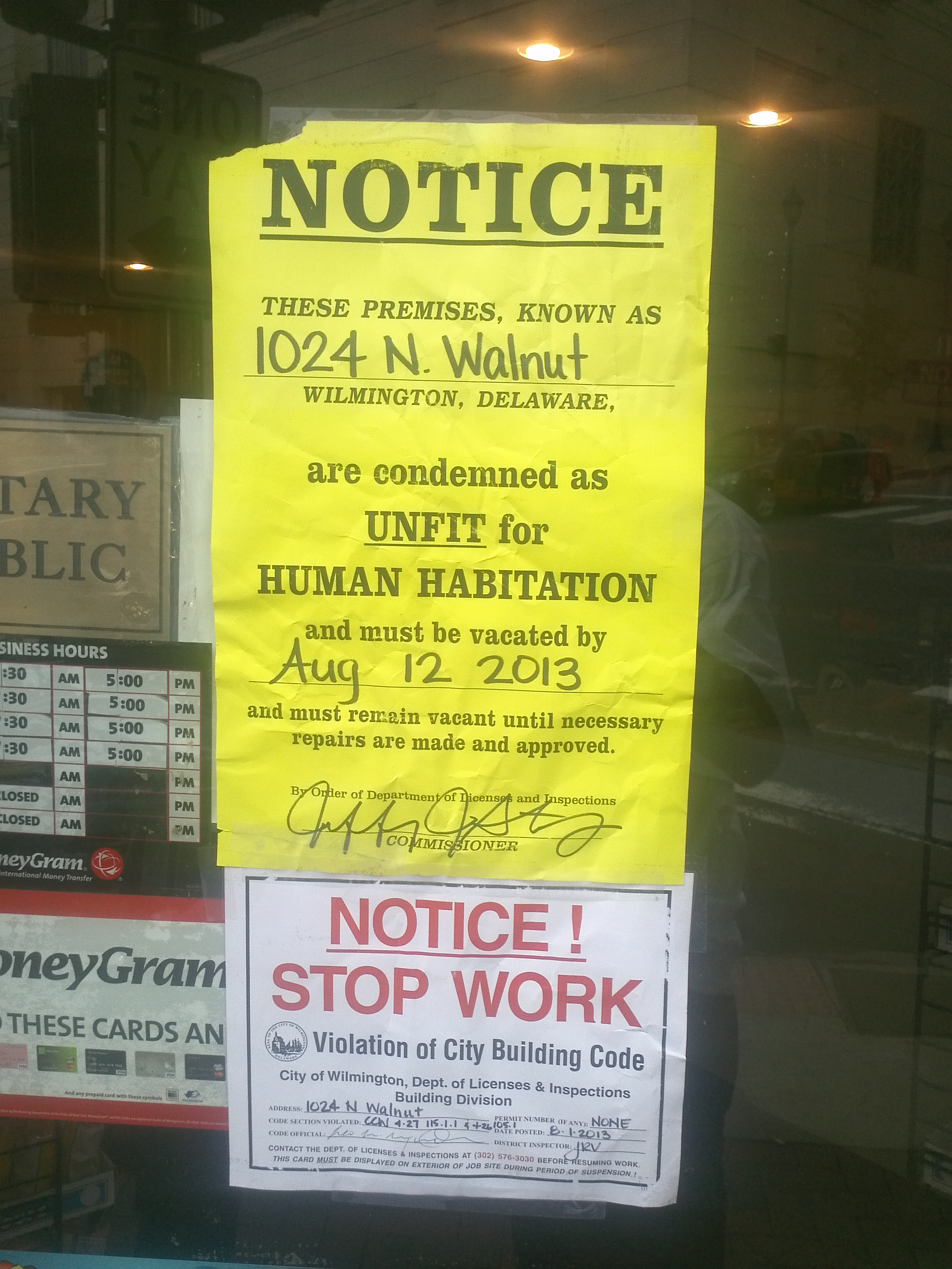 Notice of closing of Business by five State and City inspectors for installing three sheets of drywall in second floor apartment  and condemning the owners building as unfit for human habitation.