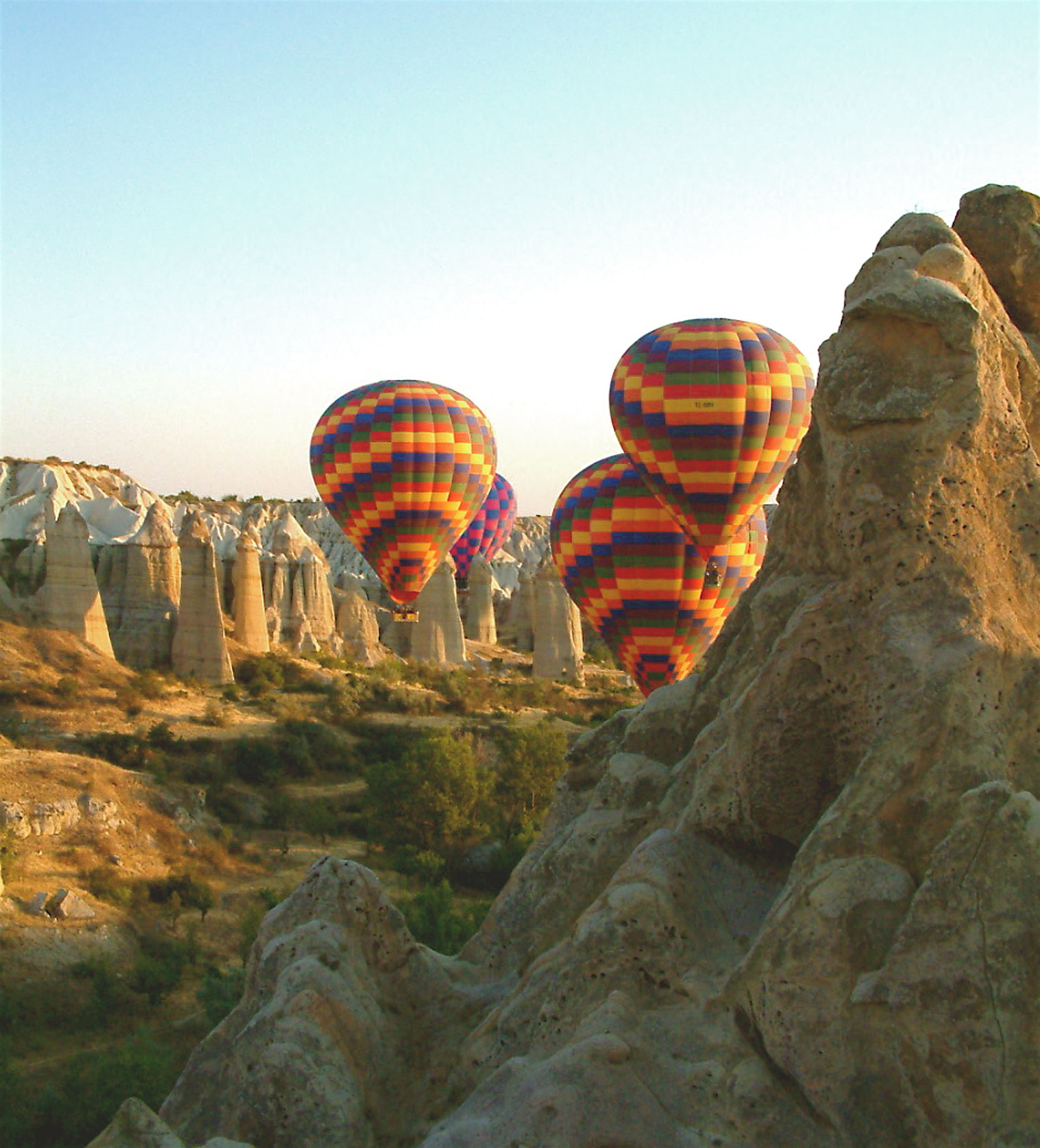 Marvel at Cappadocia's Fairy Chimneys, tall pillars of tuff topped with jaunty basalt caps.