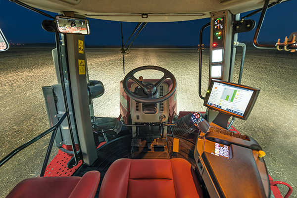 The Case IH Steiger Surveyor tractor cab makes long days more comfortable with new features such as ventilation fans for cooling leather seats, a lower slide-out cushion to provide more thigh and leg