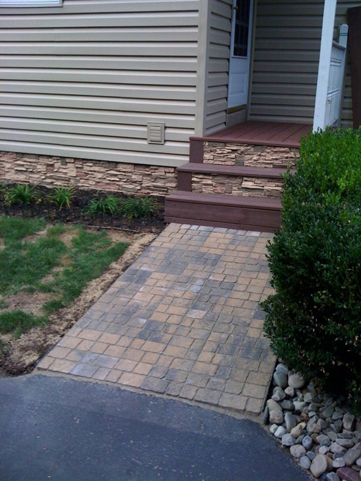 Give your home's foundation a great new look with artificial stone panells.