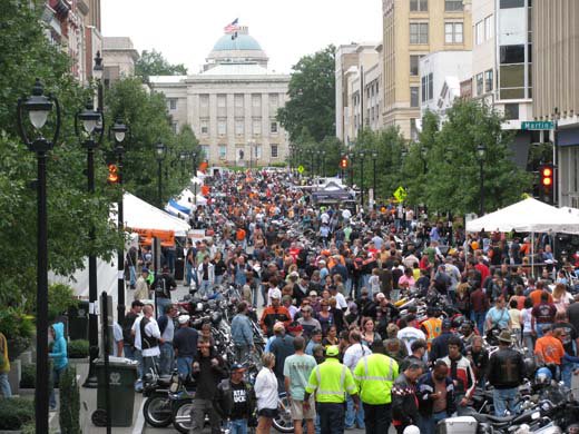 Capital City Bikefest attracts over 100,000 visitors to downtown Raleigh, with 20 bands performing on 2 stages, plus biker stunt shows, tattoo artists, food trucks, and fun for the whole family.