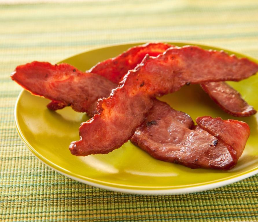 Maple Leaf Farms Duck Bacon is made exclusively with  boneless  White Pekin duck breast meat and is thick sliced with 57% less fat than traditional pork bacon.