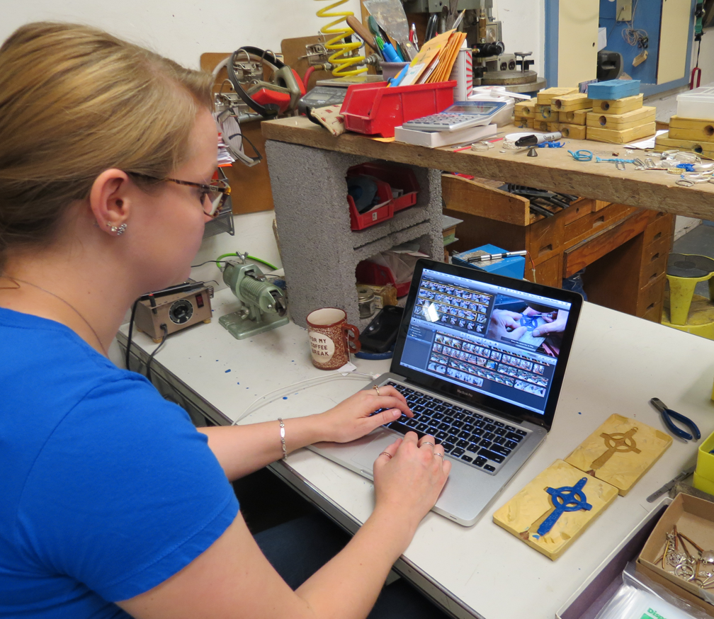 Walker Metalsmiths apprentice Lindsey editing a video on Celtic jewelry.