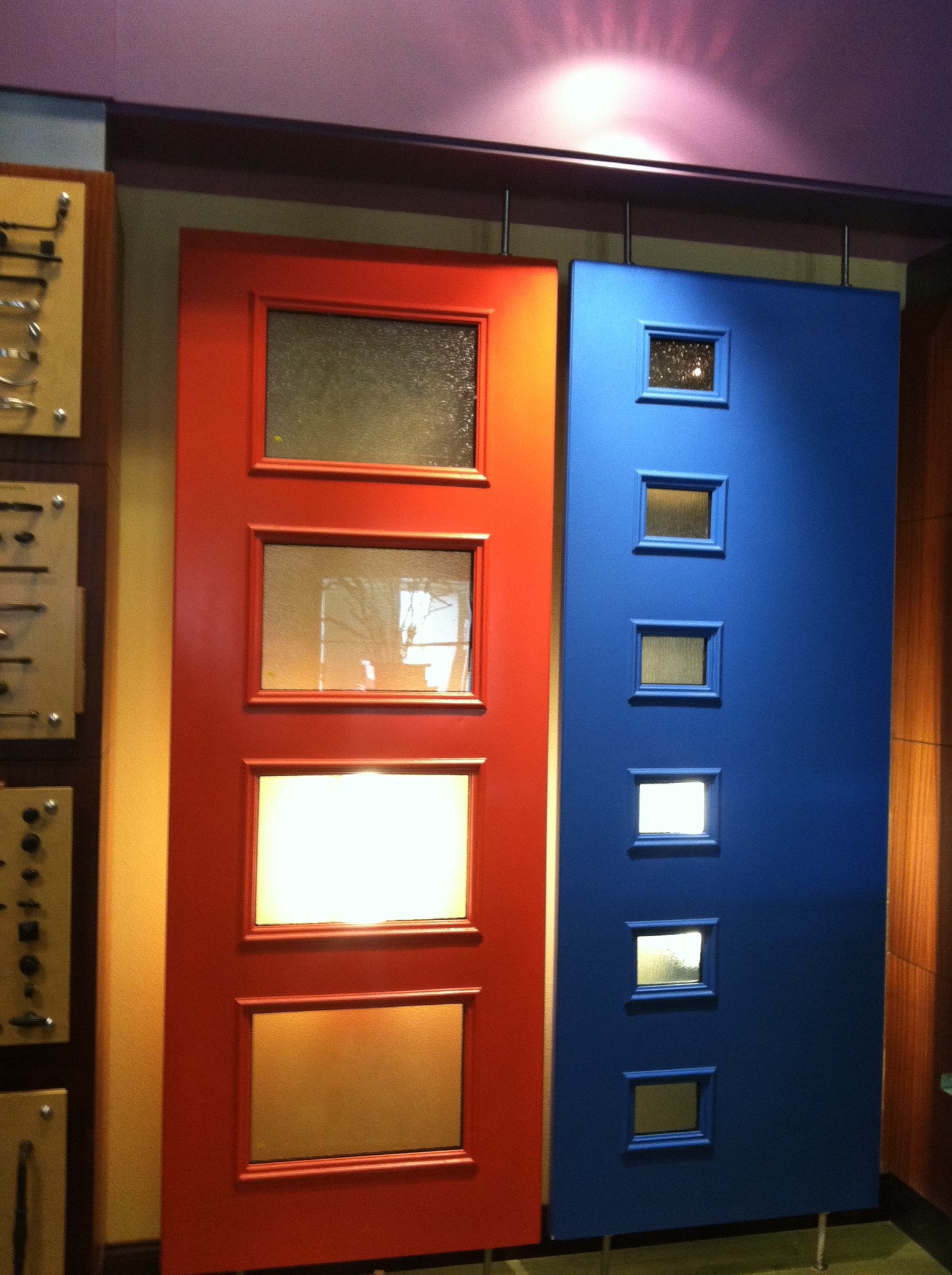 Colorful display of painted Pulse doors.