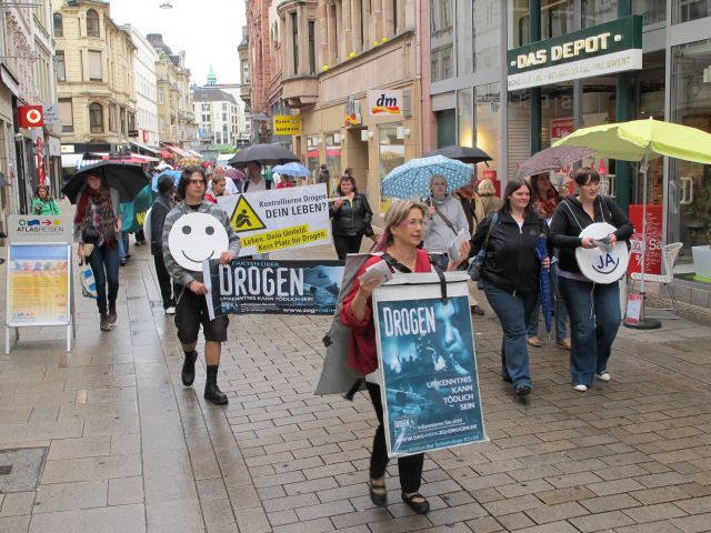 Scientologists hold a drug prevention walk on a Frankfurt walking street to draw attention to the harmful effects of drugs and promote drug-free living.