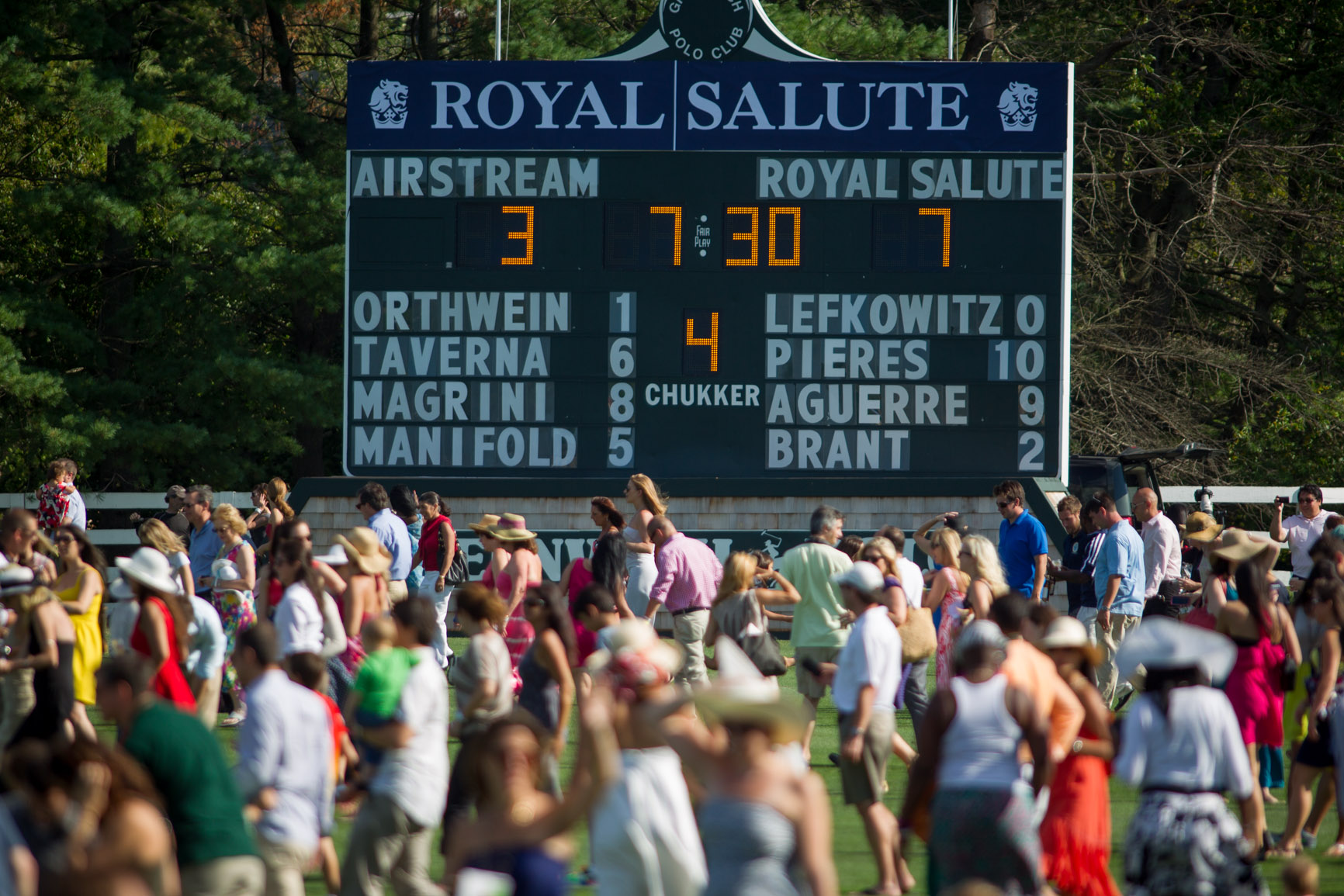 Spectators divot stomp at the Greenwich Polo Clubs Royal Salute Jubilee Cup match