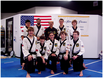 Mr. Prieto with black belts and instructors