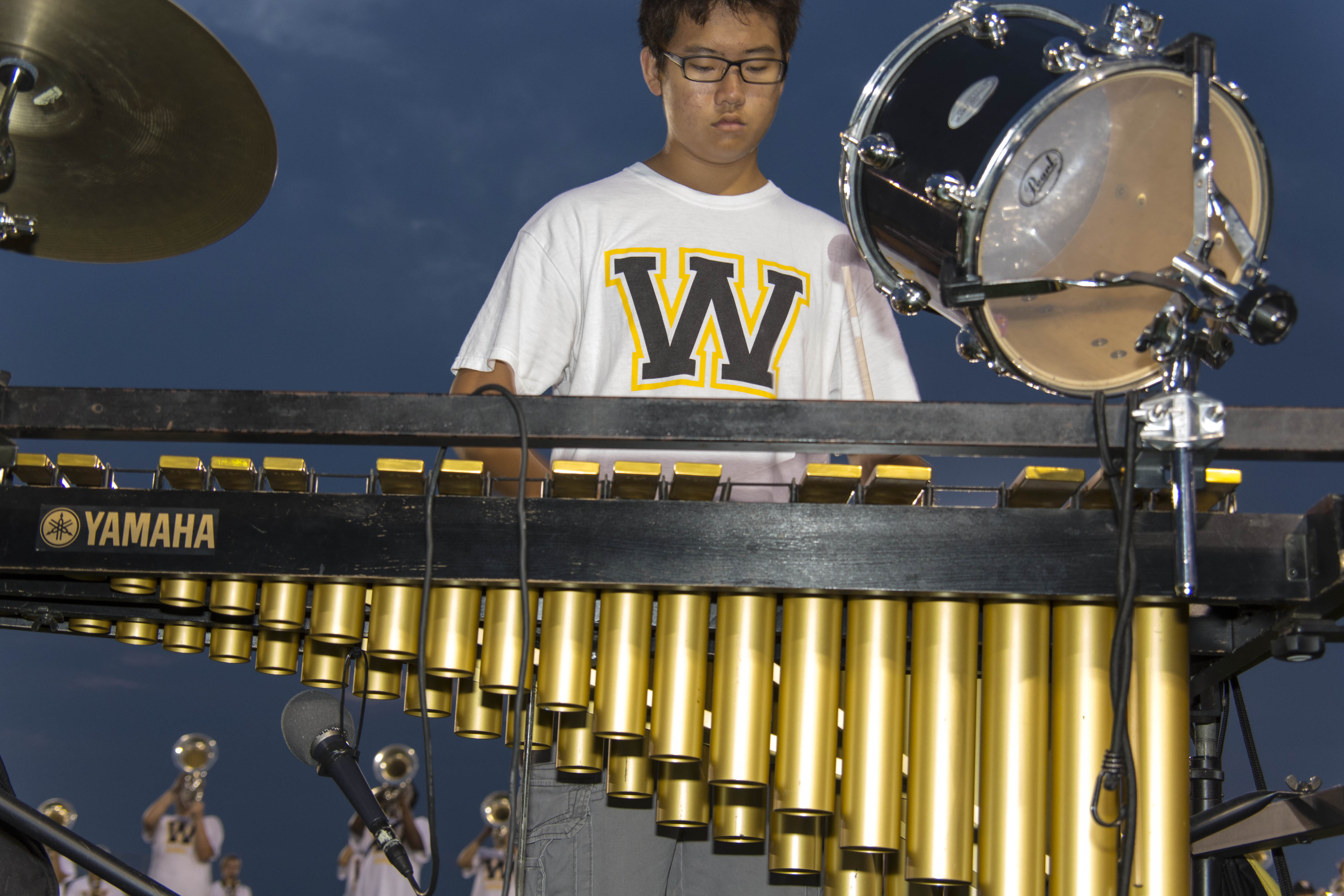 Percussionist Practices on Marimba in Preparation for Field Show