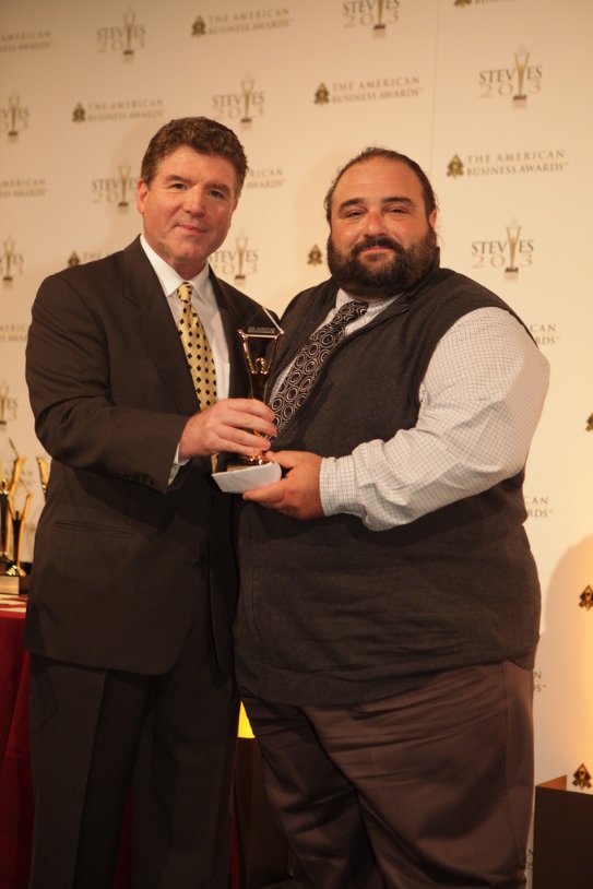 Anthony Vitiello receiving Gold Stevie Award from ABA President, Michael Gallagher