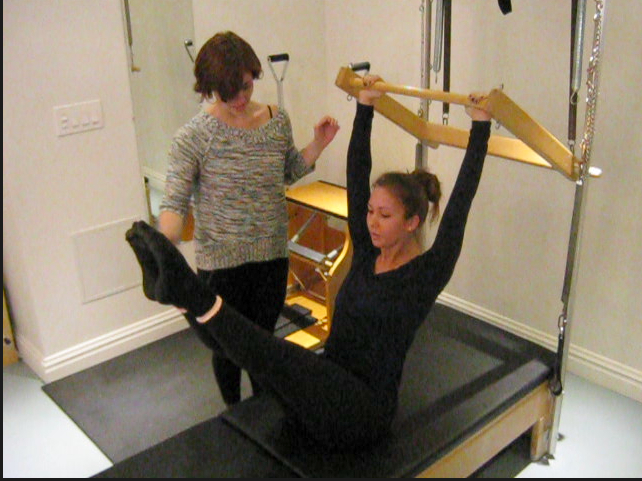 Power Your Tower - Pilates Workshop NYC - Pilates teaser exercise for deep core stability
