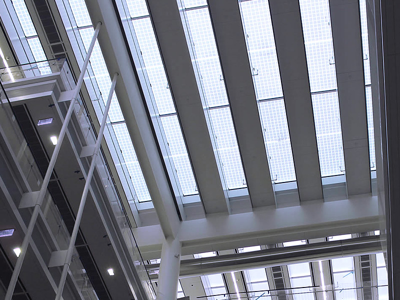 The photovoltaic glass units integrating the skylight allow daylighting while generate free energy from the Sun.