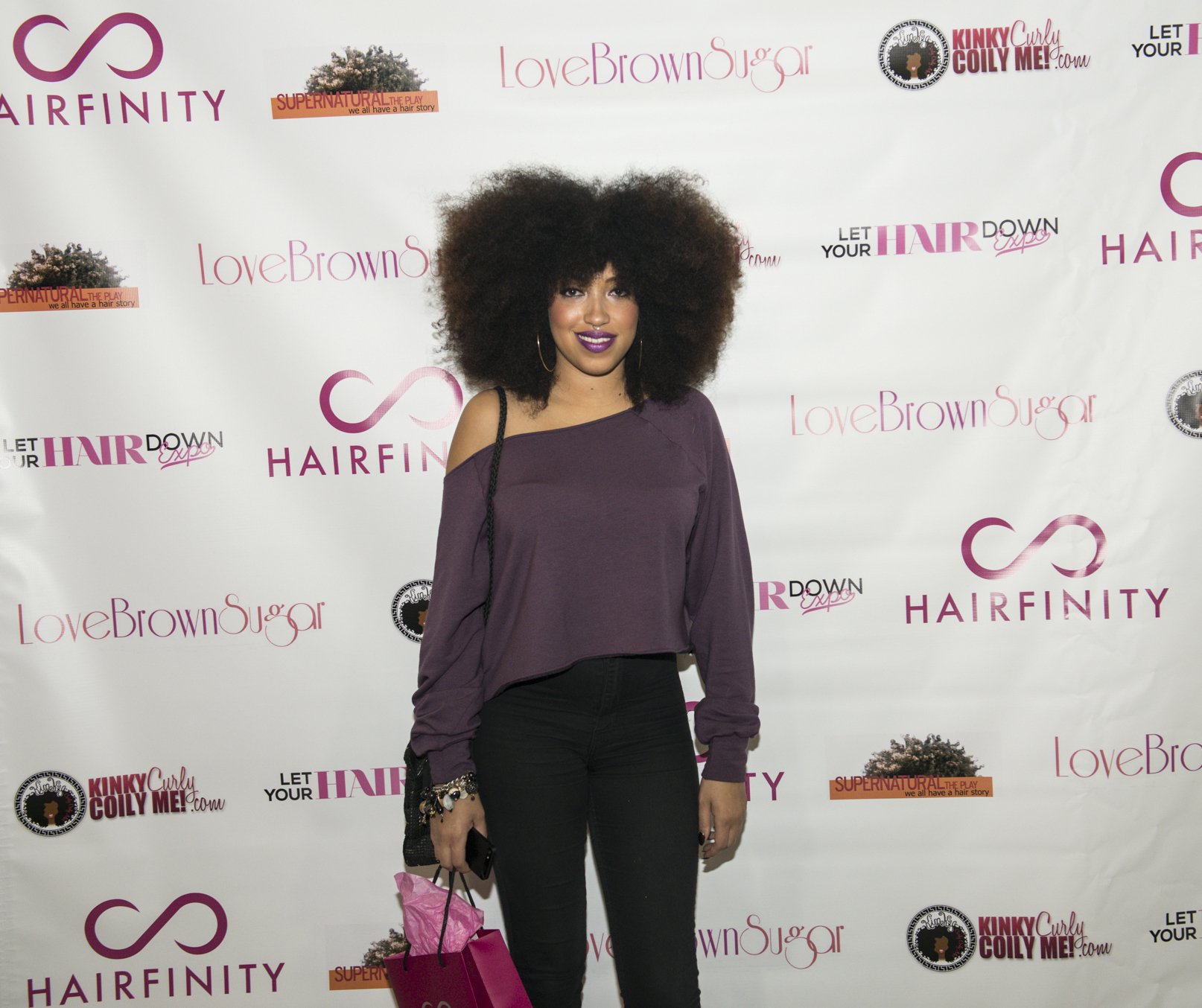 Natural hair blogger Taren Guy stopped by the Hairfinity booth to show her support at the LYHD Expo.