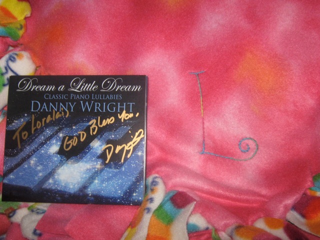 Danny Wright's new album Dream a Little Dream, with one of the Warm Hug monogrammed blankets from Wrapped In Hope