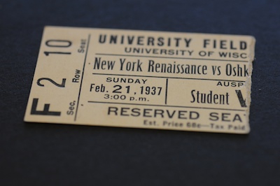 A ticket stub to a 1937 New York Renaissance vs. Oshkosh All Stars game, played at the University of Wisconsin Fieldhouse.
