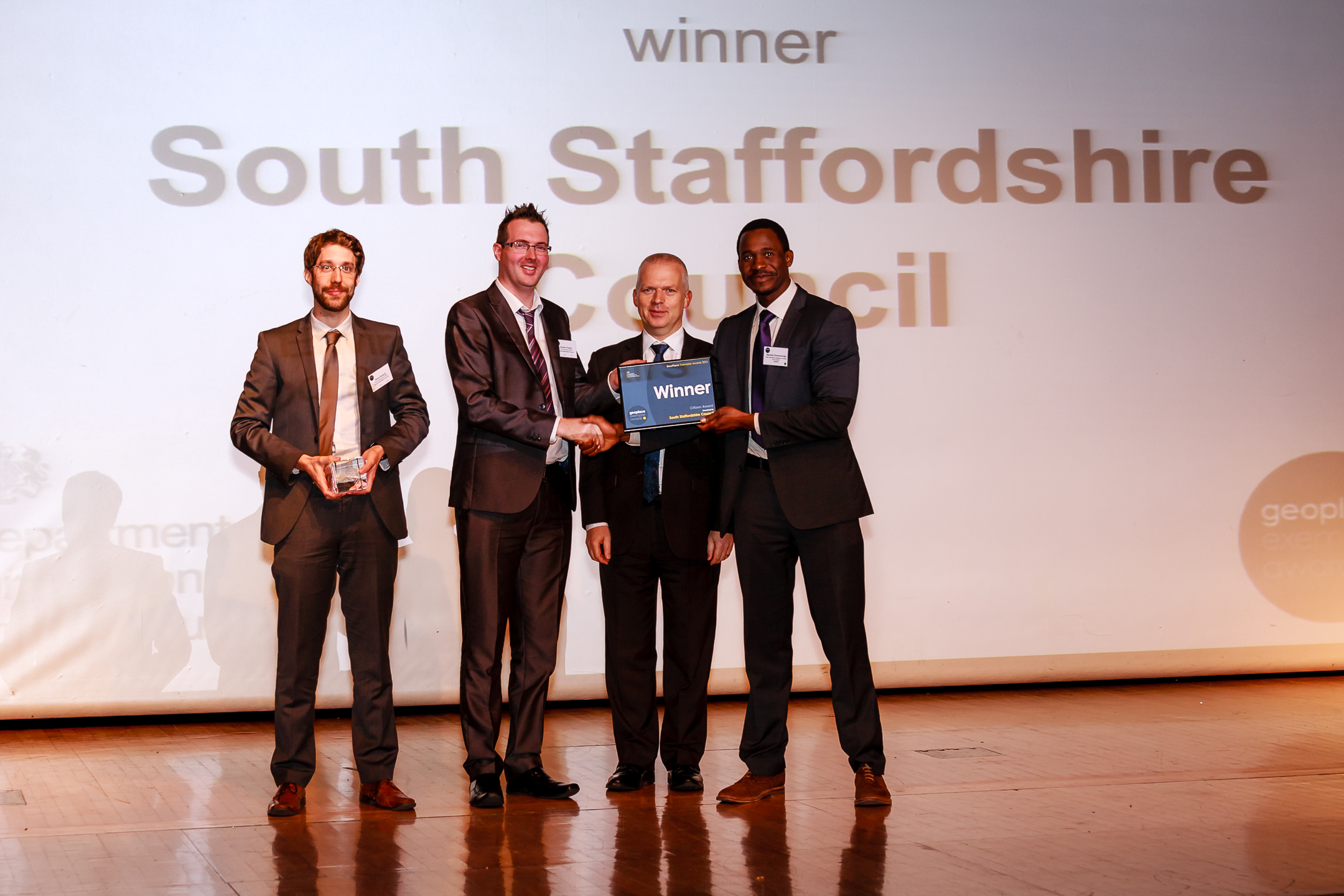 Daniel Roberts, Waste Management Officer and Andrew Preston, GIS Development Officer at South Staffordshire Council receiving their Award from Daniel Goodwin, Executive Director of Finance and Policy