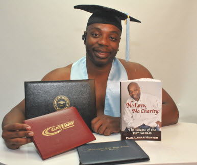 Hunter displays diplomas, certificates and his book