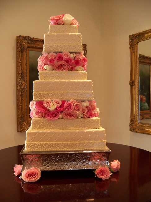 This Wedding Cake was decked in Flowers by The Vintage Violet!