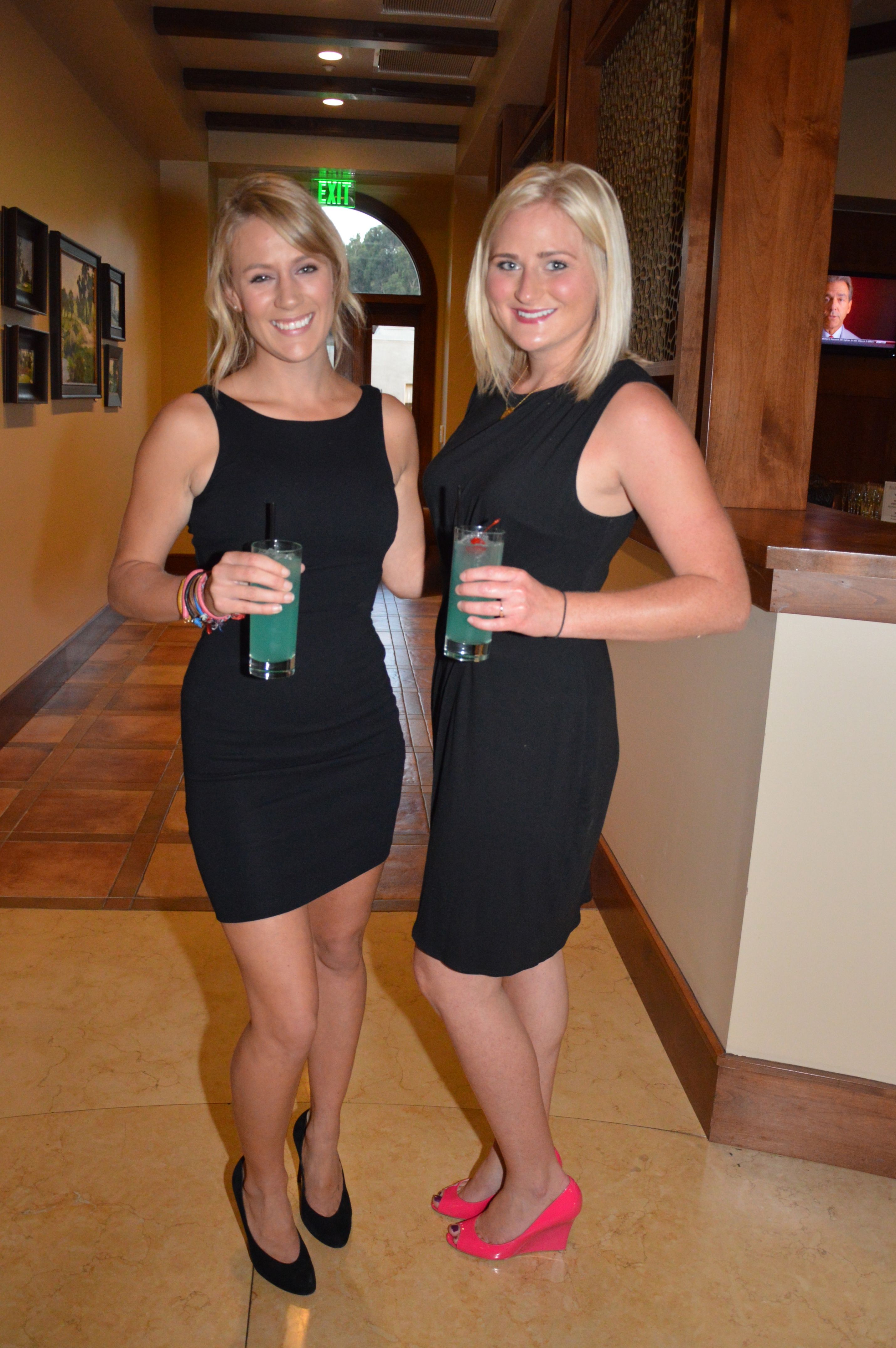 Emily Shannon and Lizzy Foxley greet guests with the signature drink, The Blue Margarita.