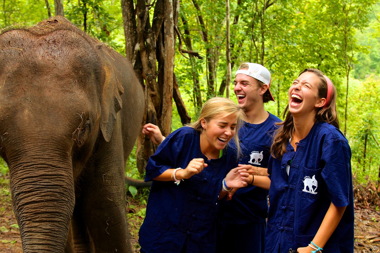 Moondance students enjoy a day of volunteering at an elephant foundation in Northern Thailand during their 24-day community service adventure.