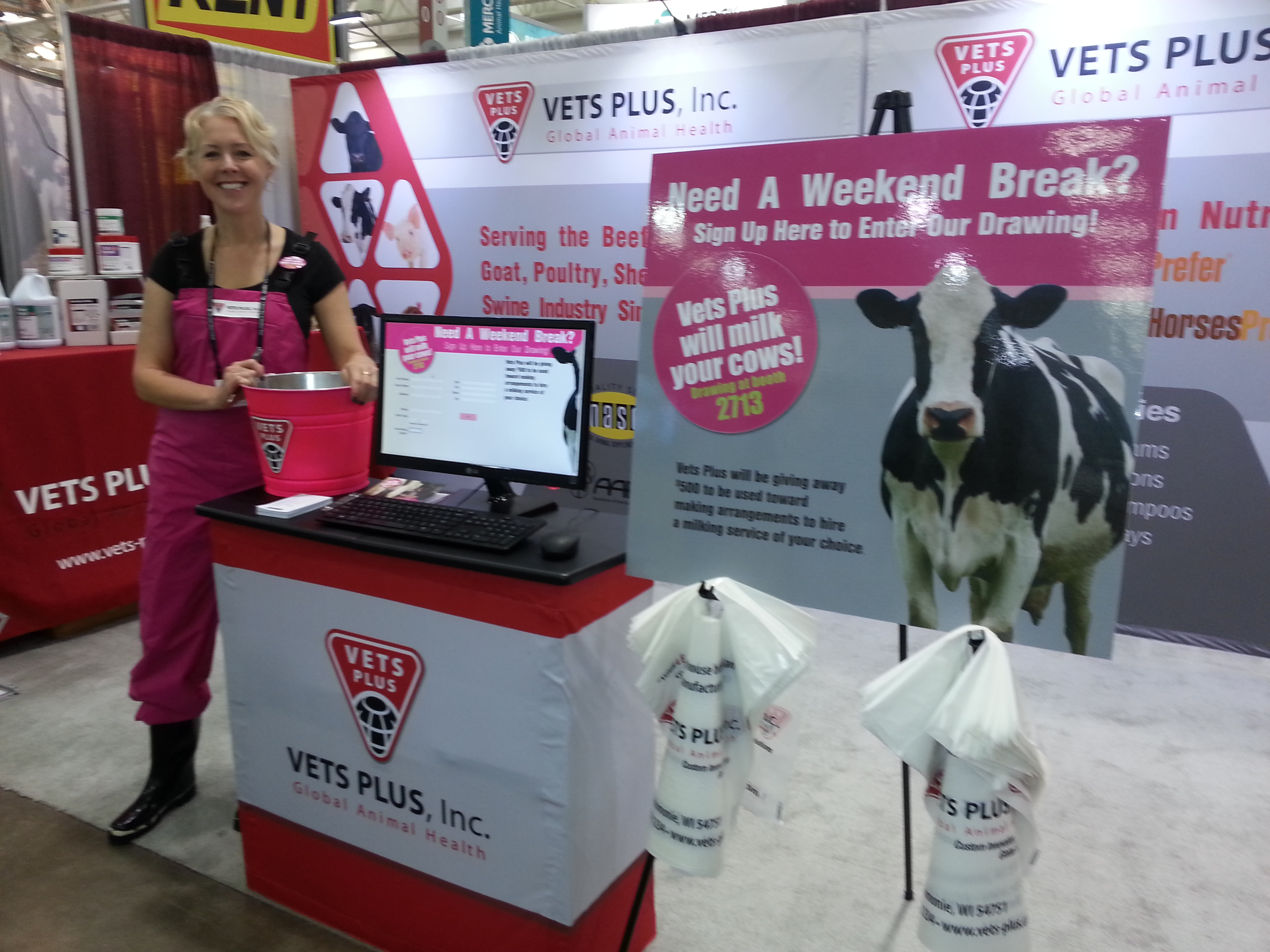Lori Mirmesdagh at the Vets Plus, Inc. booth during World Dairy Expo