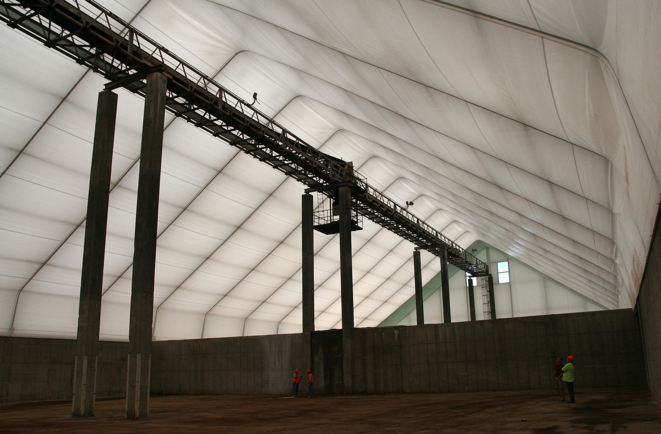 Inside shot of new Legacy tension fabric structure for Ag Partners, LLC in Albert City, Iowa.