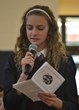 Ann Marie, an 8th grader at Everest Academy of Lemont, leads the prayers of the rosary