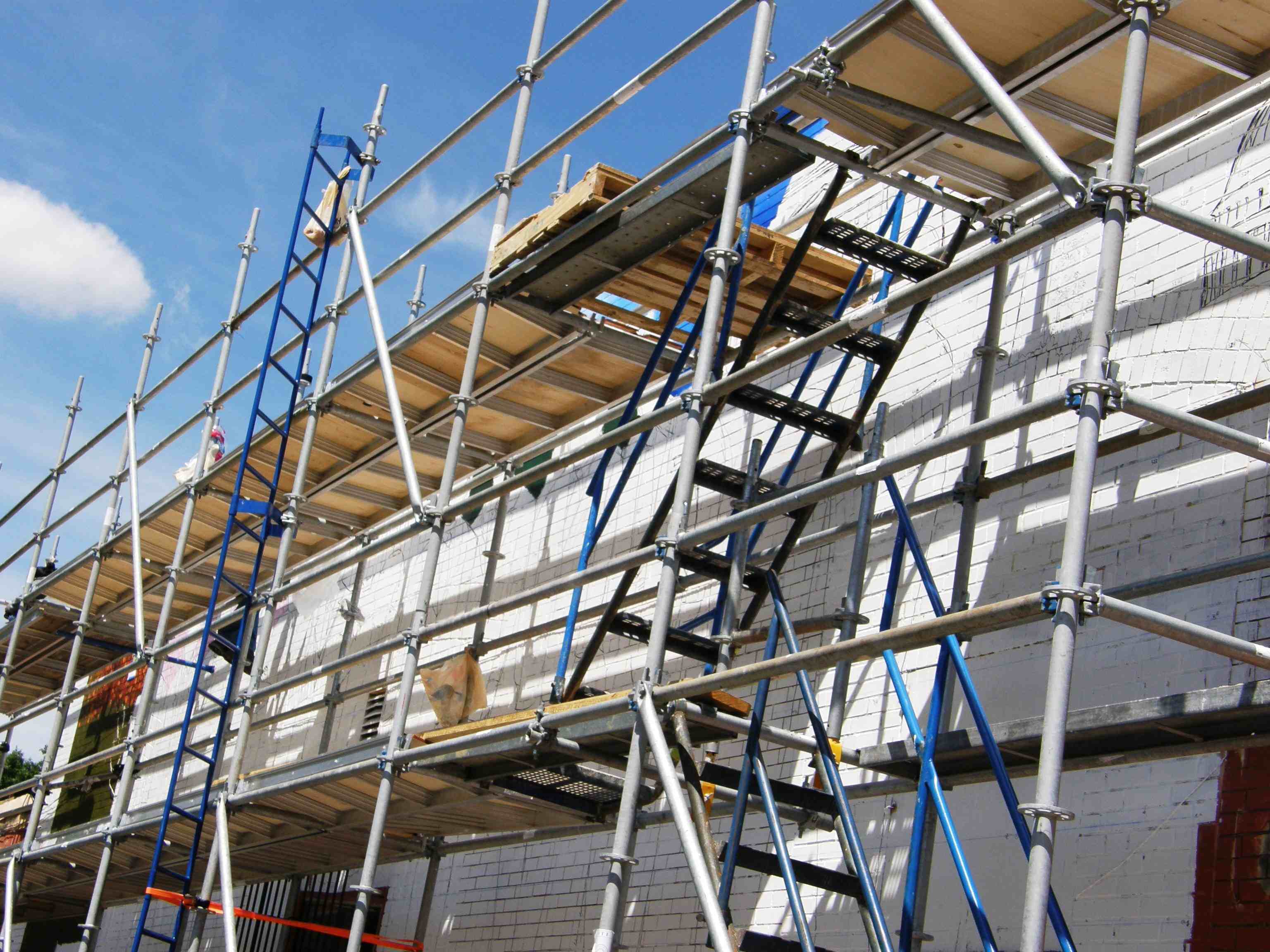 Scaffolding, construction sheds, and temporary roofs must be properly secured to resist high winds.