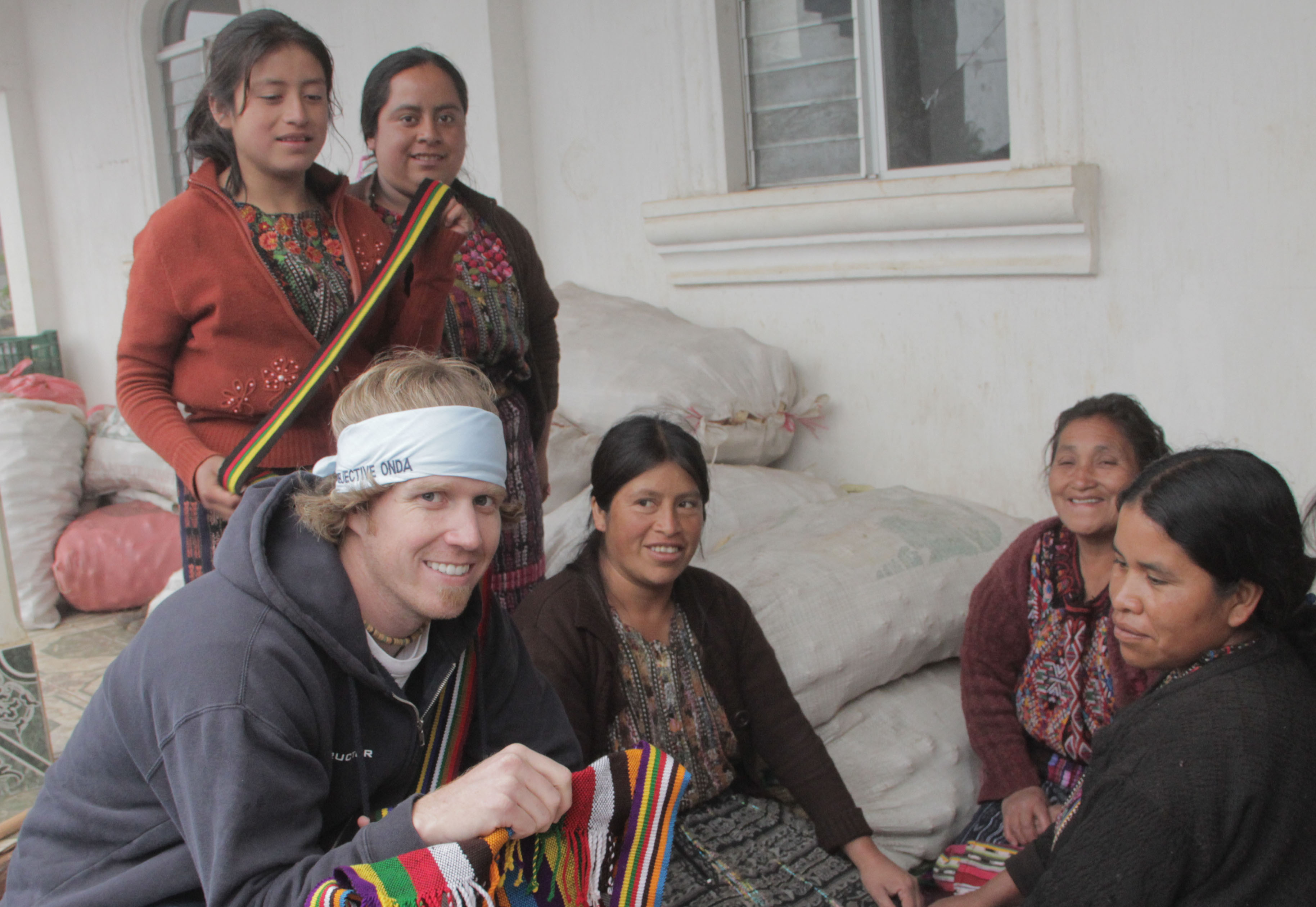 WeaveSleeve creator Andy, along with several of the female artisans involved with this project