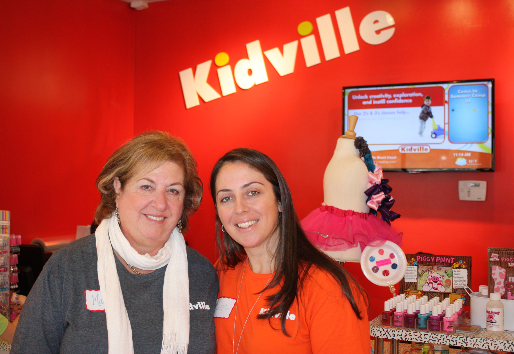Diana Mann (right), “Mayor” of Kidville Mount Kisco with her mom Marcia Schenker (left) at Kidville’s Grand Opening. Marcia is the Early Childhood Development Manager of Kidville Mount Kisco.