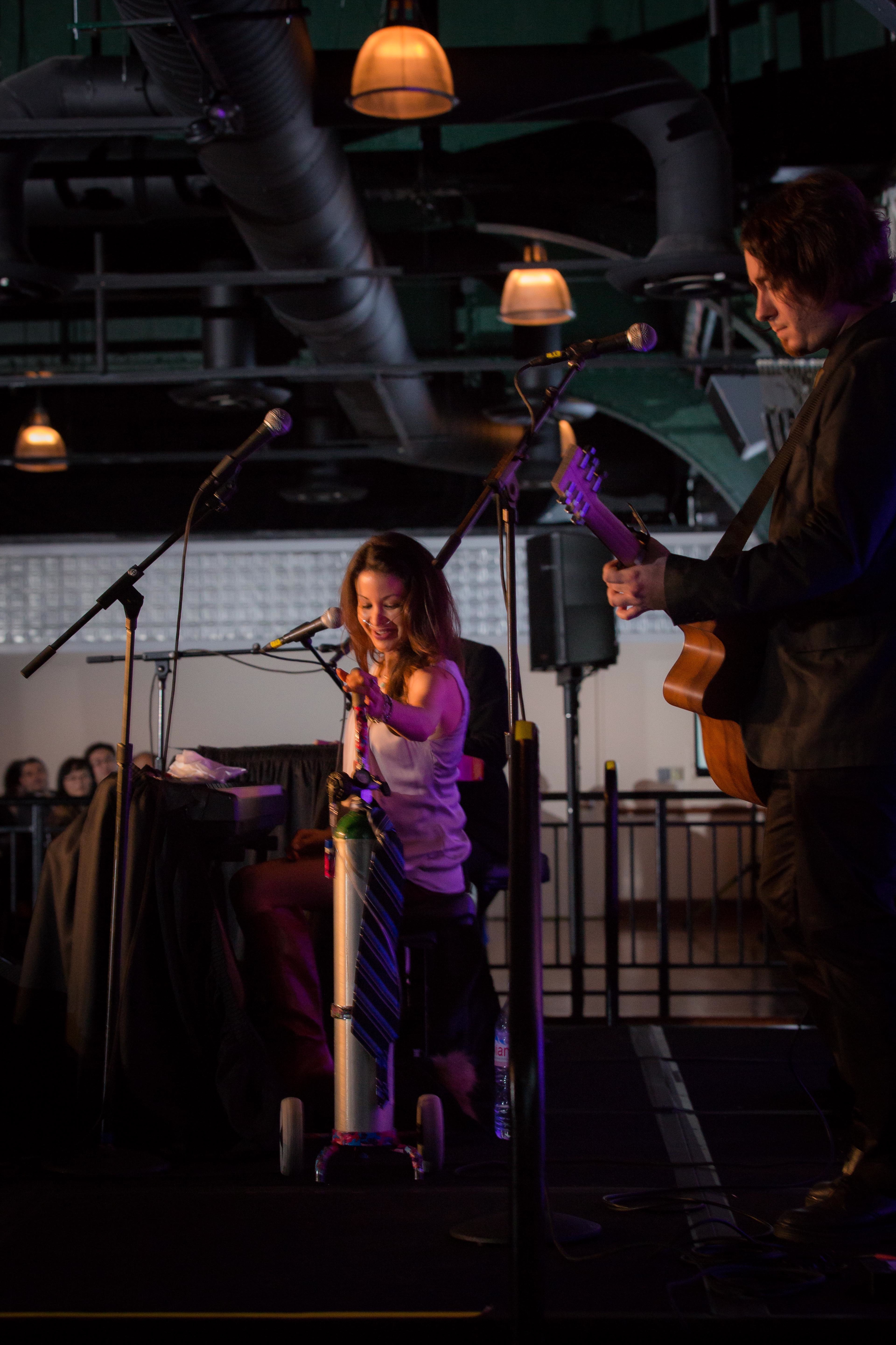 (Photo Credit Sergio Gonzalez Jr.) Chloe Temtchine introduces her oxygen tank, which she has named "Steve Martin" that she must use due to her pulmonary hypertension. "Steve" wore a tie for the event.