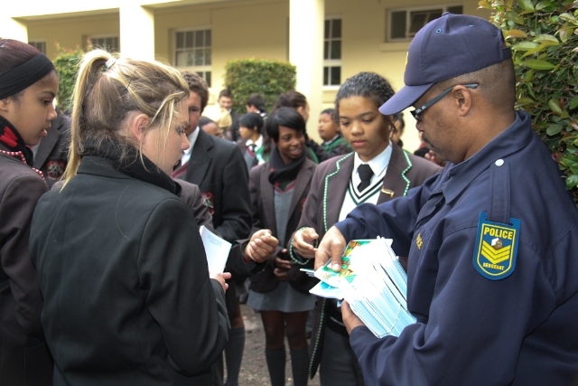 Plettenberg Bay police distributed The Way to Happiness in Afrikaans to local schools.