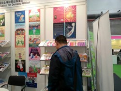 Participants browsing PODG's books at the Shanghai Children's Copyright Book Fair 2013