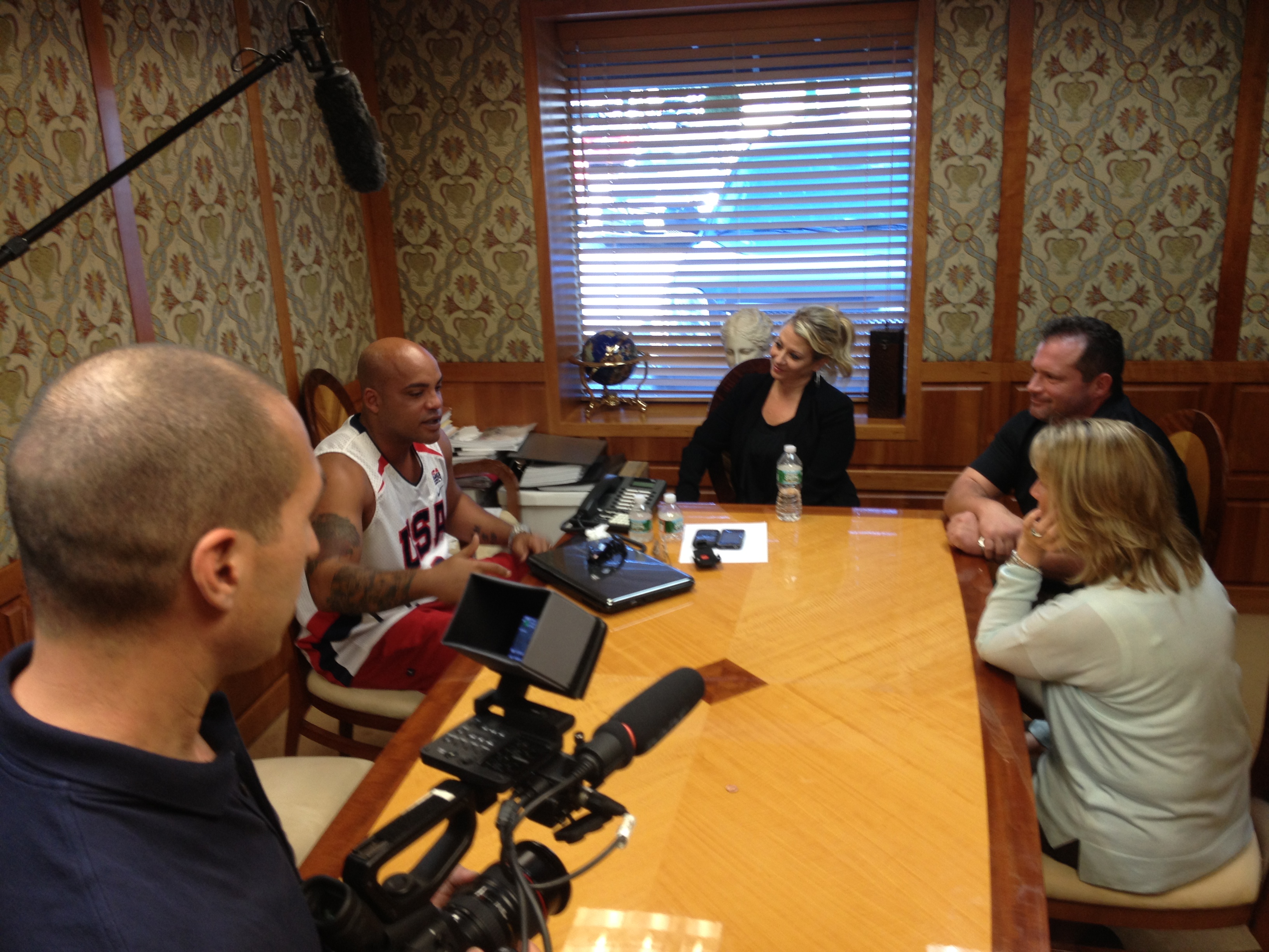 Ray Lucas, former NY Jets quarterback conducts a player peer group at P.A.S.T with case manager Jennifer Smith during filming of the GQ documentary series Casualties of the Gridiron.