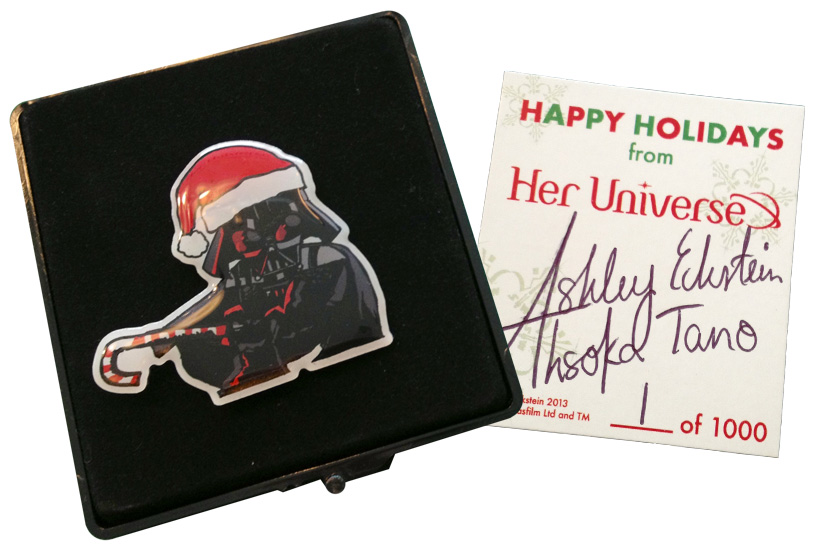 FREE with every order on HerUniverse.com -  the collectible Darth Vader holiday pin. While supplies last.