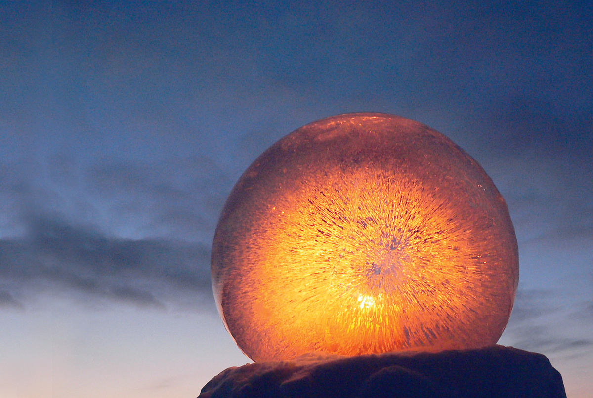 Ice globe luminaries can brighten up the winter landscape.