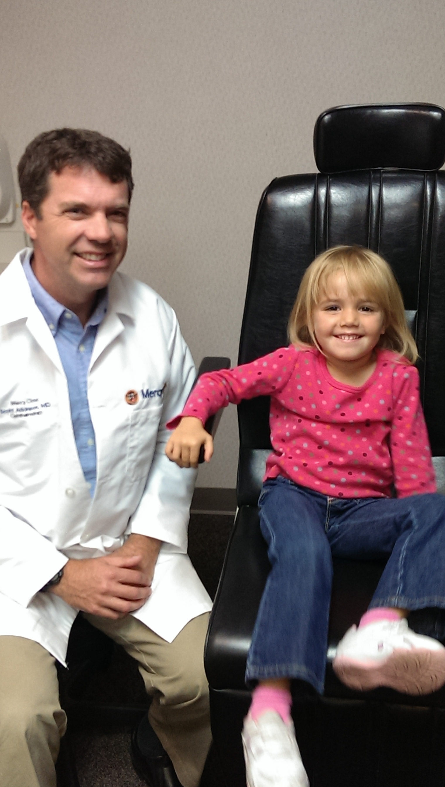 Alyssa visits with Mercy pediatric ophthalmologist, Dr. Scott Atkinson.