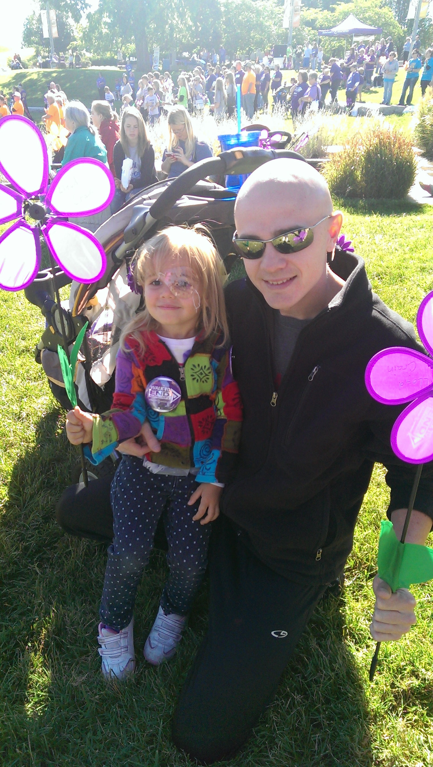 Alyssa Crain with her father, Erin. This was the walk when Erin realized Alyssa's excitement over a flock of birds meant she could finally see.