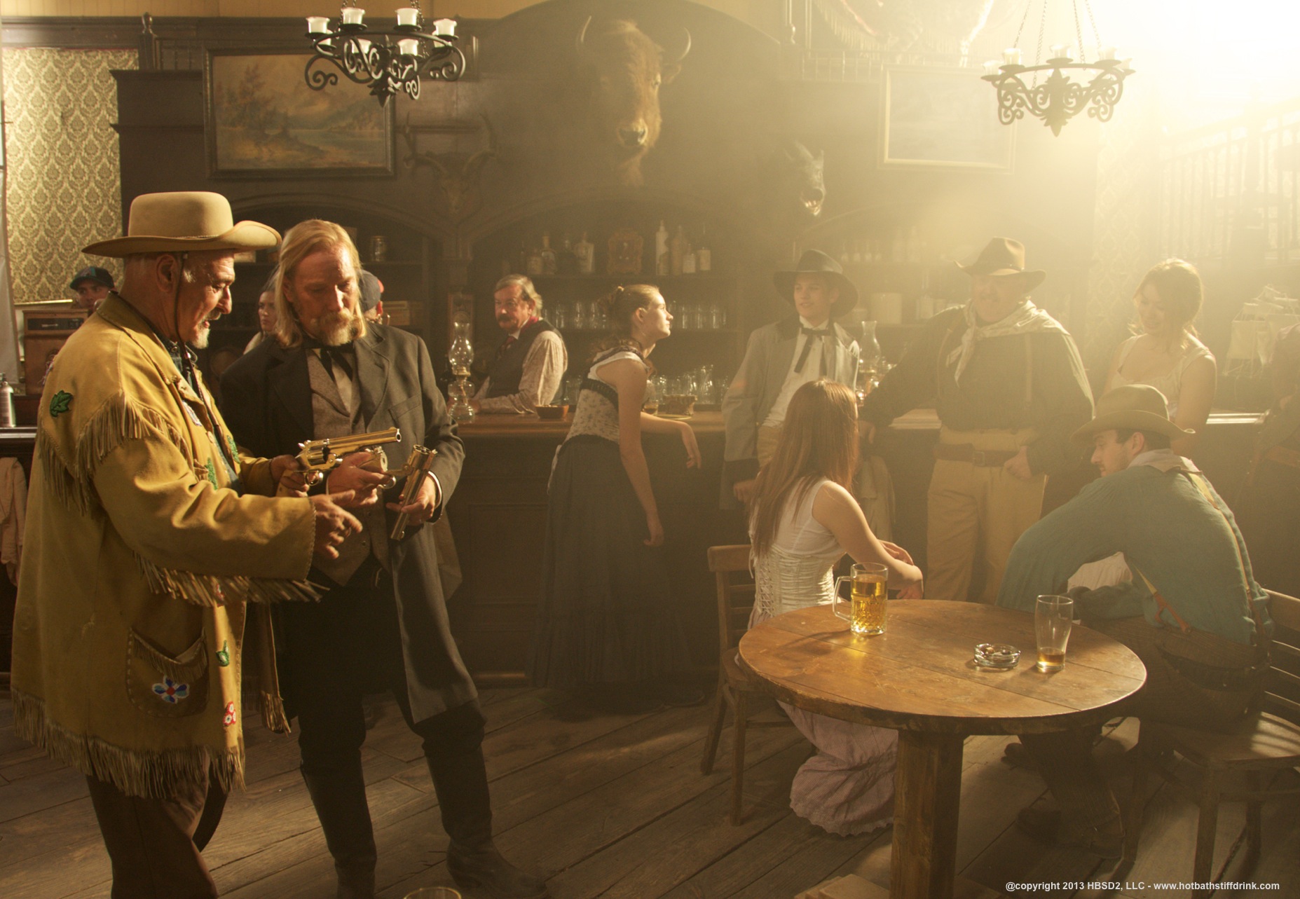 Jeffery Patterson and Peter Sherayko review weapons in the Saloon