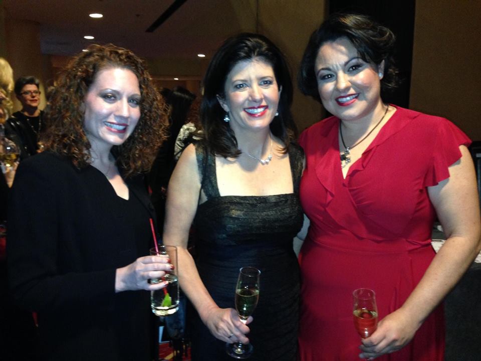 Regan Robertson, Vicki McManus, and Jackie Adame celebrate at the Stevie Women in Business Awards.