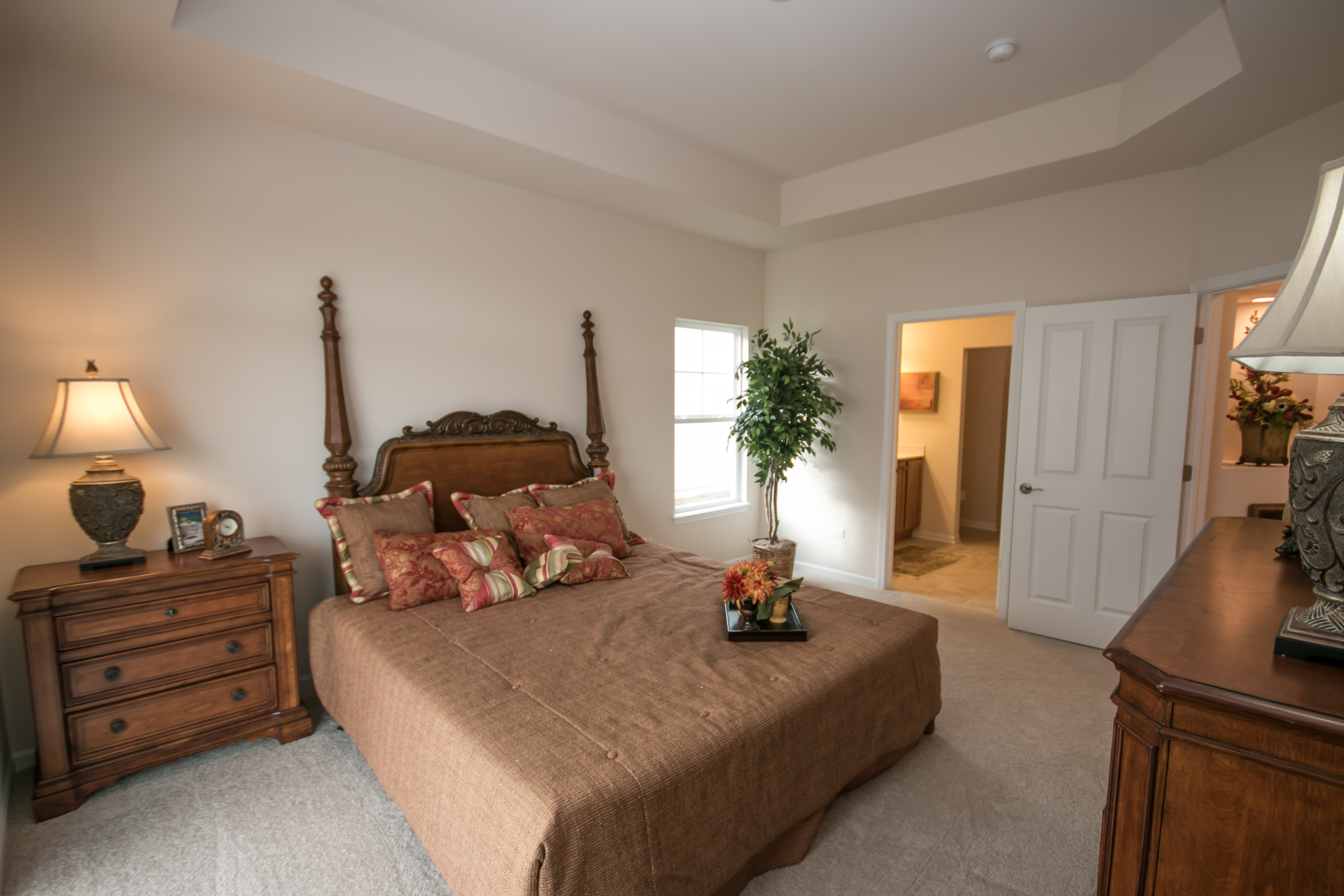 Volume ceilings, walk-in closets and large master baths complete the master suite.