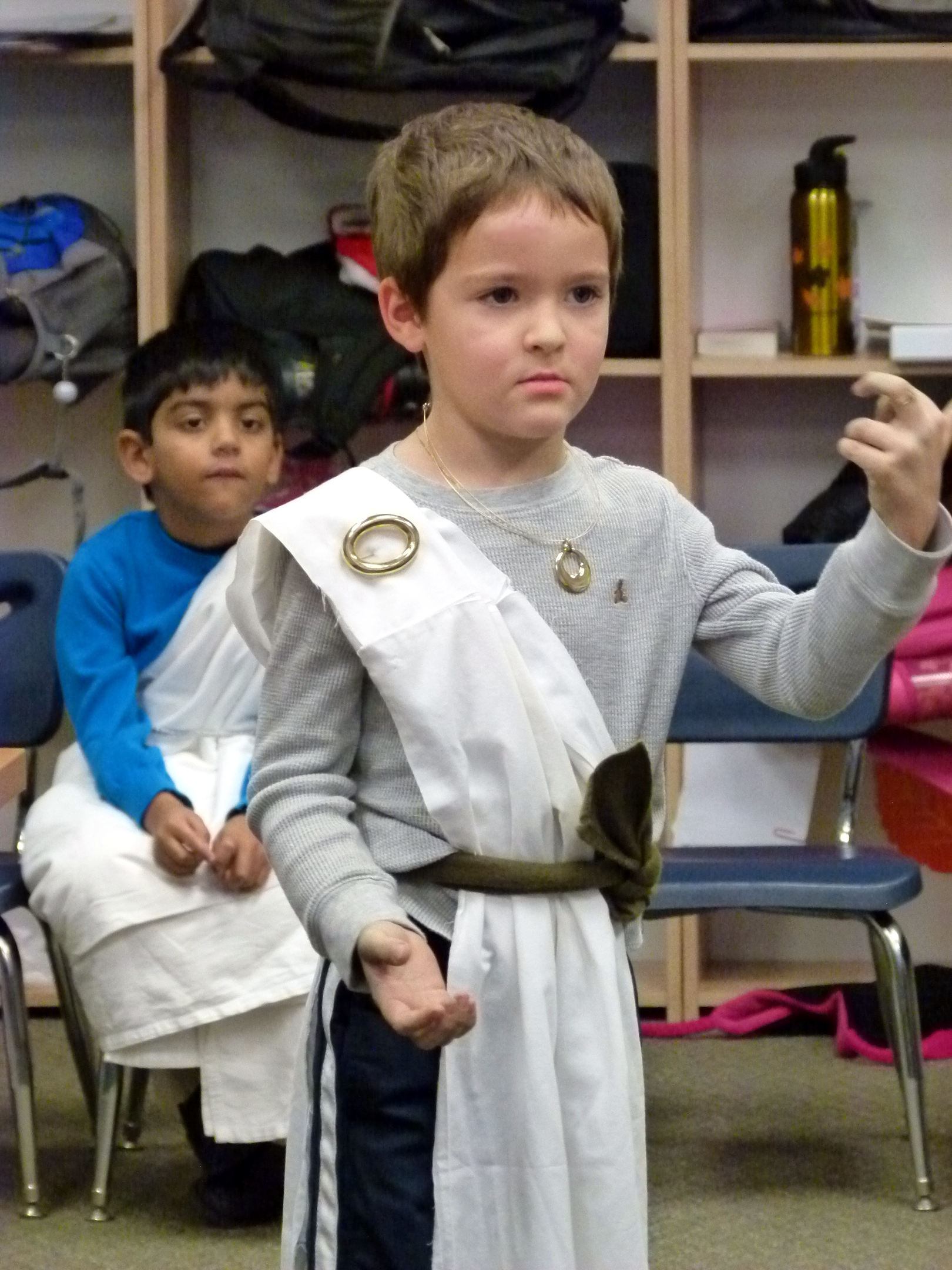 One of Primoris Academy's students showing off Roman attire during the "Rome Day" fashion show.
