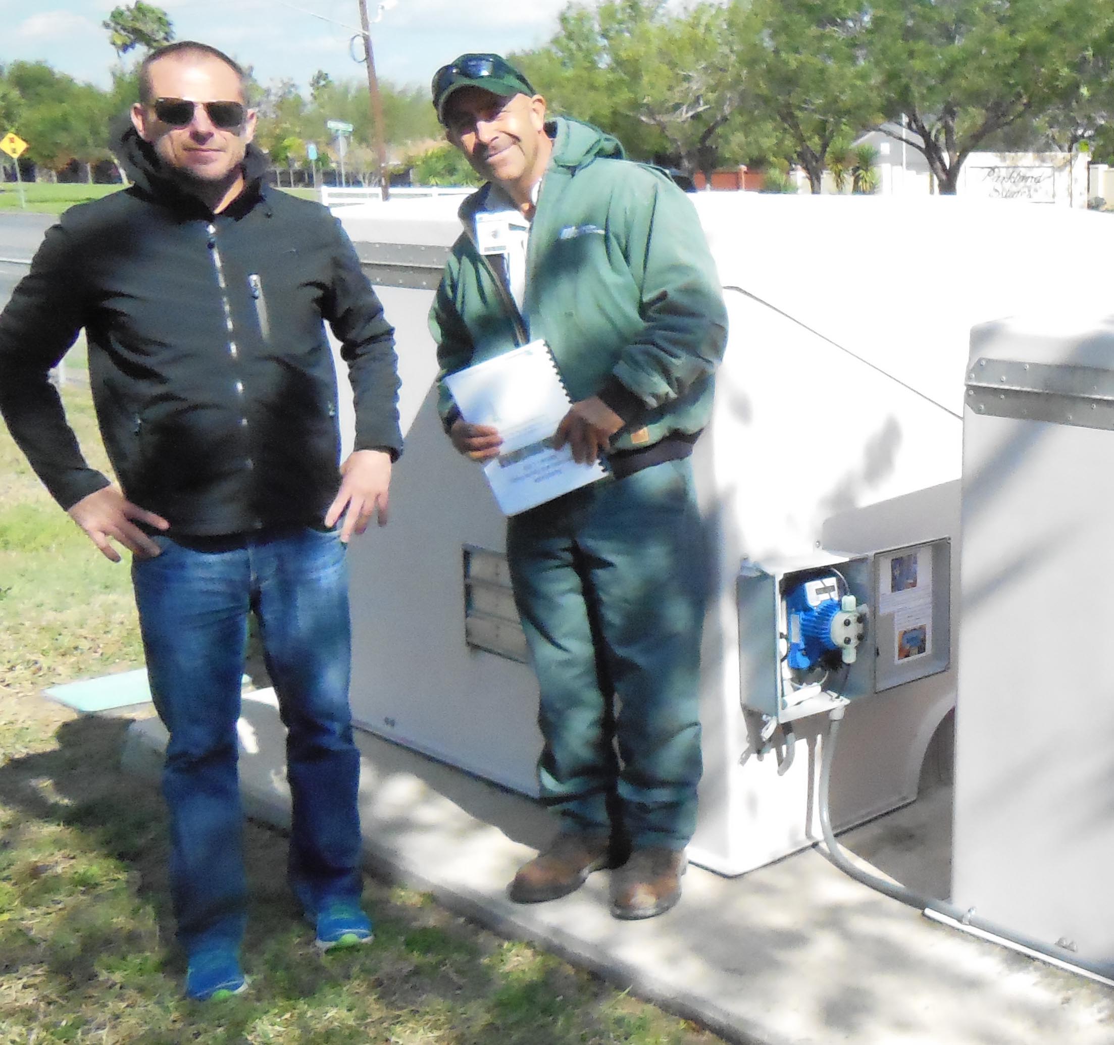 Park manager and Turf Feedijng Systems local distributor during fertigation installation