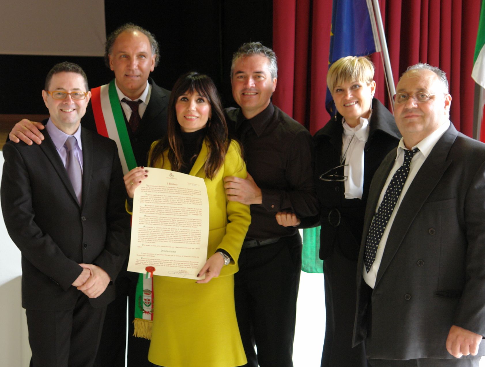 Members of the Church of Scientology of Padova and city officials of Grantorto, Italy, with the proclamation declaring November 10 as Youth for Human Rights Day.