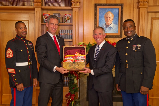 100,000 books being presented to General Pete Osman, USMC, President and CEO of the Marines Toys for Tots in L. Ron Hubbard Library at Author Services, Inc.