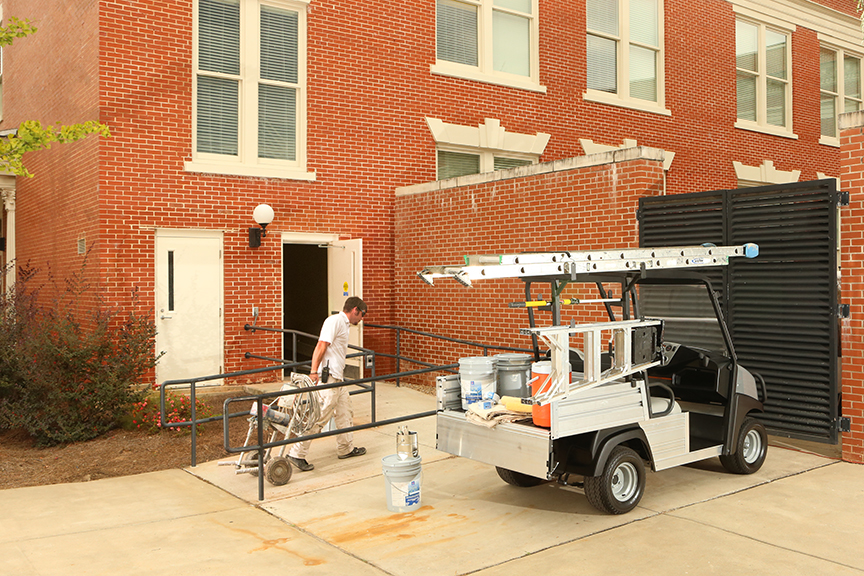 This Carryall 300 is equipped with ladder racks and other equipment to free space on the bed and keep painters working.