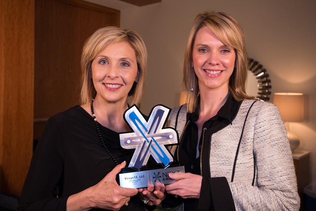 Virsys12 Founder and President Tammy Hawes and partner Valerie Landkammer with the 2013 NEXT Award for Technology Startup