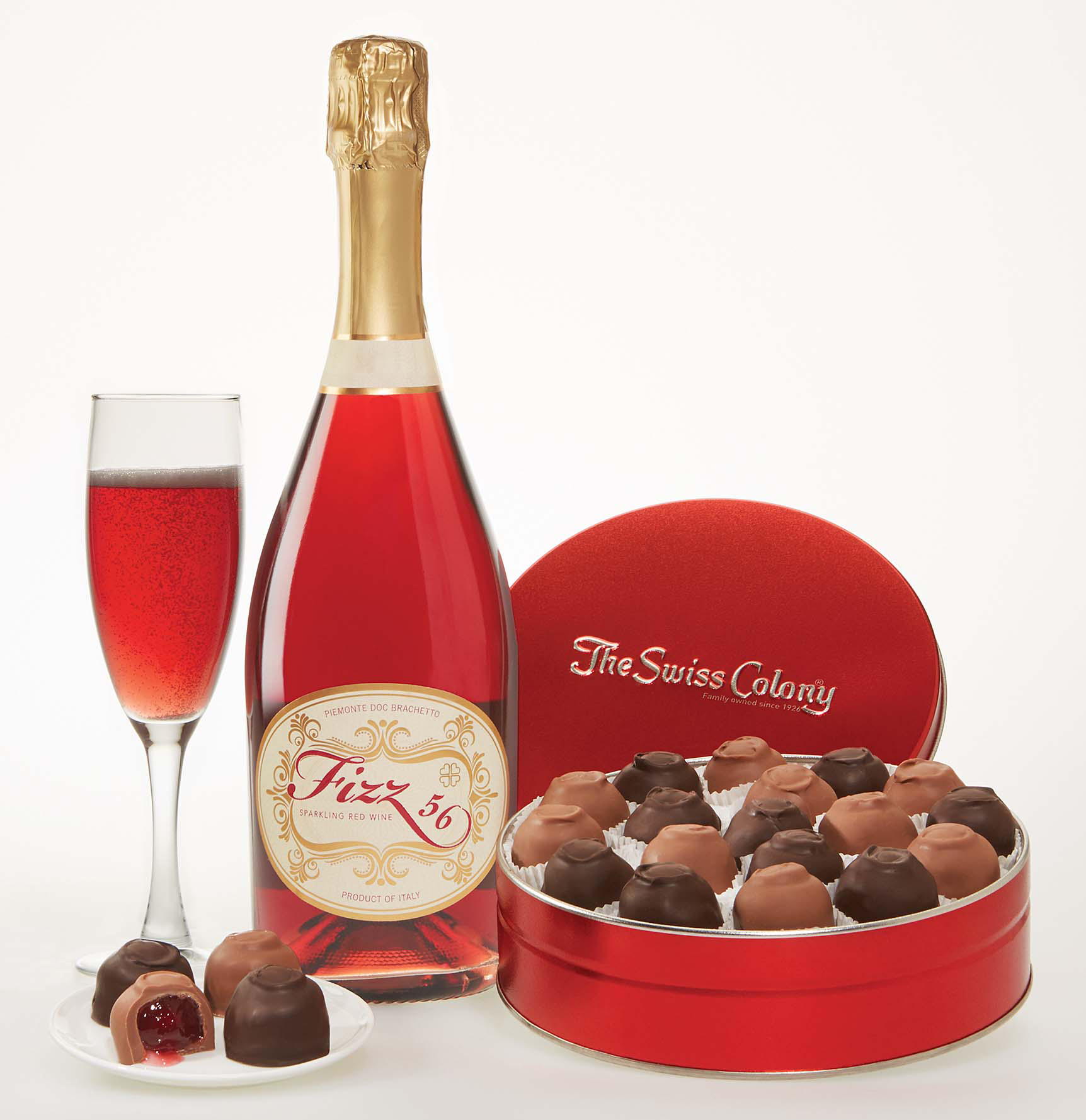 Chocolate covered cherries and pink bubbly perk up holiday parties.