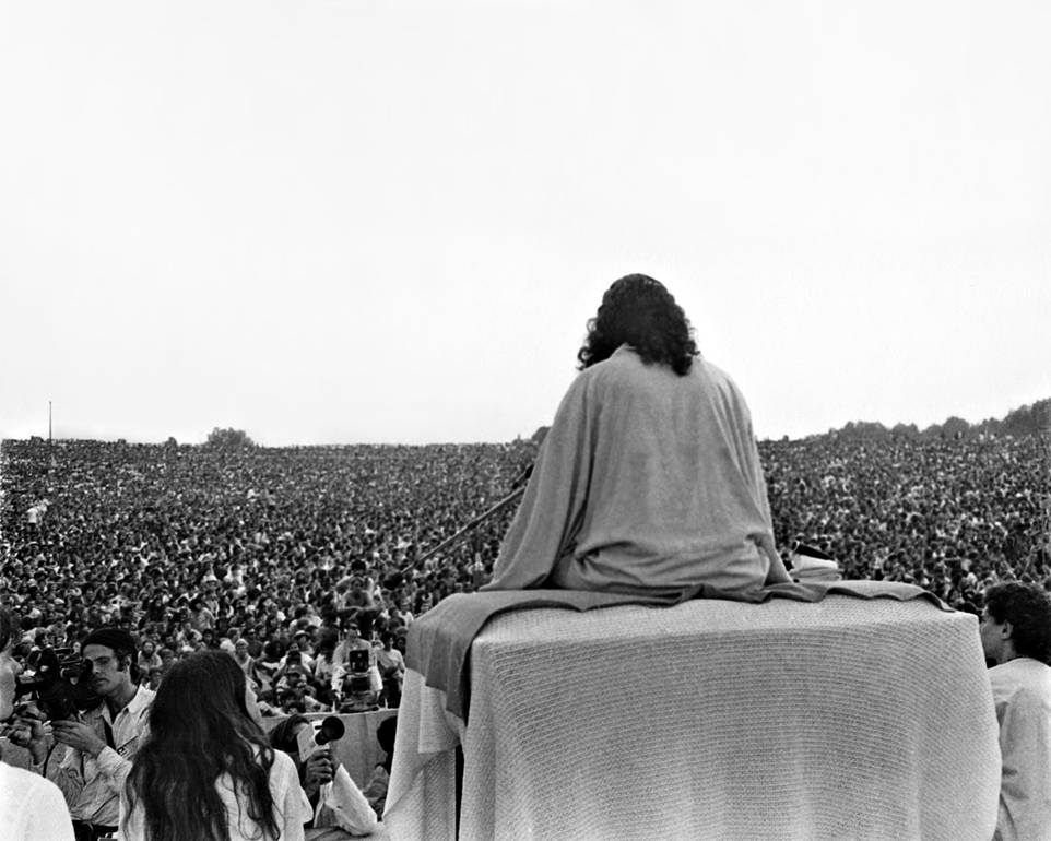 Swami Satchidananda at the 1969 Woodstock Music and Arts Festival where he gave the official opening remarks.